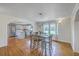 Elegant dining area with hardwood floors and seamless flow to the kitchen at 1314 Cooper Store Rd, Moncks Corner, SC 29461
