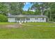Charming one-story home with a landscaped yard and inviting curb appeal at 1314 Cooper Store Rd, Moncks Corner, SC 29461
