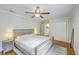 This primary bedroom features a comfy bed, ceiling fan, a walk-in closet at 1314 Cooper Store Rd, Moncks Corner, SC 29461