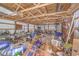 Interior of storage building featuring exposed beams and plentiful storage at 1314 Cooper Store Rd, Moncks Corner, SC 29461