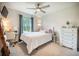 Comfortable bedroom with a ceiling fan, a window view, and a desk area at 141 Pine Crest View Dr, Summerville, SC 29486
