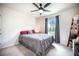 Cozy bedroom with neutral carpet, a ceiling fan, and a window view at 141 Pine Crest View Dr, Summerville, SC 29486