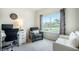 Bright and inviting office space with a desk, chair, and a large window at 141 Pine Crest View Dr, Summerville, SC 29486