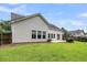 The backyard is a well maintained lawn with a patio and fencing for privacy at 1445 Ashley Gardens Blvd, Charleston, SC 29414