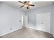 Bedroom with light blue walls, carpet, ceiling fan and standard double door closet at 1445 Ashley Gardens Blvd, Charleston, SC 29414