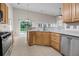 Well-equipped kitchen with stainless steel appliances, granite countertops, and stylish wooden cabinets at 1445 Ashley Gardens Blvd, Charleston, SC 29414