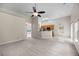 Spacious living room showcases an open floor plan with a ceiling fan and transitions into the kitchen at 1445 Ashley Gardens Blvd, Charleston, SC 29414