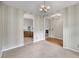 Bright room showing the architectural details between rooms and featuring striped wallpaper at 1445 Ashley Gardens Blvd, Charleston, SC 29414