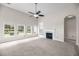 Bright and airy living room featuring vaulted ceilings, a fireplace, built-in shelving, and lots of natural light at 1445 Ashley Gardens Blvd, Charleston, SC 29414