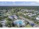 Scenic aerial view showcasing community amenities including a pool, clubhouse and landscaping at 1489 Red Tide Rd, Mount Pleasant, SC 29466