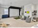 Finished basement with home theater, seating area, and golf simulation, perfect for entertainment at 1489 Red Tide Rd, Mount Pleasant, SC 29466