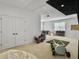 Bright basement featuring carpeted floors, ample natural light, and recreational activities at 1489 Red Tide Rd, Mount Pleasant, SC 29466