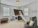 Bright bedroom with a playhouse bed, neutral decor, and carpet flooring at 1489 Red Tide Rd, Mount Pleasant, SC 29466