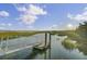 Community dock along tranquil waterfront provides access to peaceful natural marshland scenery at 1489 Red Tide Rd, Mount Pleasant, SC 29466