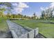 Community horseshoe pit on a lush lawn with neatly trimmed landscaping at 1489 Red Tide Rd, Mount Pleasant, SC 29466
