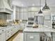 Modern kitchen with granite countertops, stainless steel appliances, and ample cabinet space at 1489 Red Tide Rd, Mount Pleasant, SC 29466