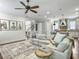Spacious living room leads to a staircase and open kitchen at 1489 Red Tide Rd, Mount Pleasant, SC 29466