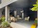 Outdoor patio featuring lounge seating, ceiling fan, and TV at 1489 Red Tide Rd, Mount Pleasant, SC 29466