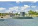 A themed play area with replica submarine and cannon features, accompanied by a picnic area and green lawn at 1489 Red Tide Rd, Mount Pleasant, SC 29466