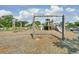Community playground with swings, a slide, and a wooden lookout tower for Gathering fun at 1489 Red Tide Rd, Mount Pleasant, SC 29466