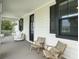 Inviting porch with seating and architectural details, offering a relaxed outdoor space at 1489 Red Tide Rd, Mount Pleasant, SC 29466