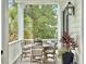 Picturesque porch featuring a table setting, ideal for outdoor dining and relaxation at 1489 Red Tide Rd, Mount Pleasant, SC 29466