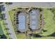 An aerial view of new community tennis courts with pristine landscaping and walking paths at 1489 Red Tide Rd, Mount Pleasant, SC 29466