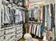 Spacious walk-in closet with ample storage, shelving, and organized clothing racks at 1489 Red Tide Rd, Mount Pleasant, SC 29466