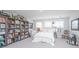 Cozy bedroom featuring a full bookcase, natural light, and a comfortable bed at 1515 Pogonia St # 2, Mount Pleasant, SC 29466