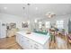 Bright and airy kitchen featuring a large island with white countertop and hardwood floors at 1515 Pogonia St # 2, Mount Pleasant, SC 29466