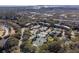 Panoramic aerial view of a well-planned community featuring tennis courts and natural surroundings at 1605 Live Oak Park, Seabrook Island, SC 29455