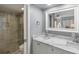 Modern bathroom with a double sink vanity, a glass-enclosed shower, and neutral finishes at 1605 Live Oak Park, Seabrook Island, SC 29455