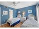 Charming bedroom with twin beds, offering a serene retreat with stylish decor and natural light at 1605 Live Oak Park, Seabrook Island, SC 29455