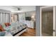 Bright bedroom with a plush bed, complemented by a view to the balcony at 1605 Live Oak Park, Seabrook Island, SC 29455