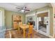Dining space with view of the screened porch and coastal-themed decor at 1605 Live Oak Park, Seabrook Island, SC 29455