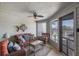 Screened in back porch with cozy seating and coastal decor at 1605 Live Oak Park, Seabrook Island, SC 29455