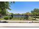 Landscaped view of the community tennis courts, framed by lush greenery at 1605 Live Oak Park, Seabrook Island, SC 29455