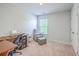 Comfortable home office with a desk, chair, ottoman, and natural light from a window at 163 Spencer Cir, Summerville, SC 29485