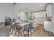 Dining area featuring table set for six, with kitchen area in the background at 184 Kirkland St, Goose Creek, SC 29445