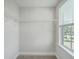 Spacious walk-in closet with ample shelving and a large window for natural light at 184 Kirkland St, Goose Creek, SC 29445
