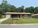 Charming brick home with a well-manicured lawn and a classic mailbox at 2 Clarksville Ln, Goose Creek, SC 29445