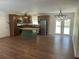 Open kitchen and dining area featuring wood cabinets, stainless appliances, and an island at 2 Clarksville Ln, Goose Creek, SC 29445