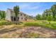 Large backyard with newly installed wooden fence and pond at 2018 Quiet Ibis Rd, Hanahan, SC 29410