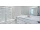 Modern bathroom featuring a glass shower and vanity with a sleek, streamlined design at 2018 Quiet Ibis Rd, Hanahan, SC 29410