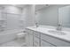 Well-lit bathroom features a bathtub and a vanity with double sinks at 2018 Quiet Ibis Rd, Hanahan, SC 29410