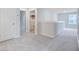 Hallway leads to a bedroom and closet offering practical storage solutions at 2018 Quiet Ibis Rd, Hanahan, SC 29410