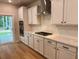 Well-appointed kitchen features quartz countertops, stainless steel appliances, white subway tile, and modern fixtures at 2018 Quiet Ibis Rd, Hanahan, SC 29410