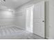 Spacious walk-in closet with shelving for ample storage, and carpeted floor at 2018 Quiet Ibis Rd, Hanahan, SC 29410