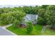A beautiful aerial view of a home surrounded by lush greenery and mature trees at 2031 Thornhill Dr, Summerville, SC 29485