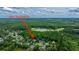 Expansive aerial view of 2031 Thornhill Dr surrounded by a lush, green neighborhood near Ashley River Park at 2031 Thornhill Dr, Summerville, SC 29485